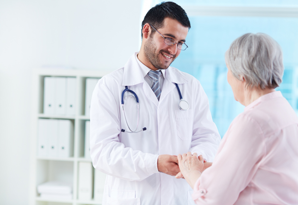 Healthcare professional supporting a patient at home